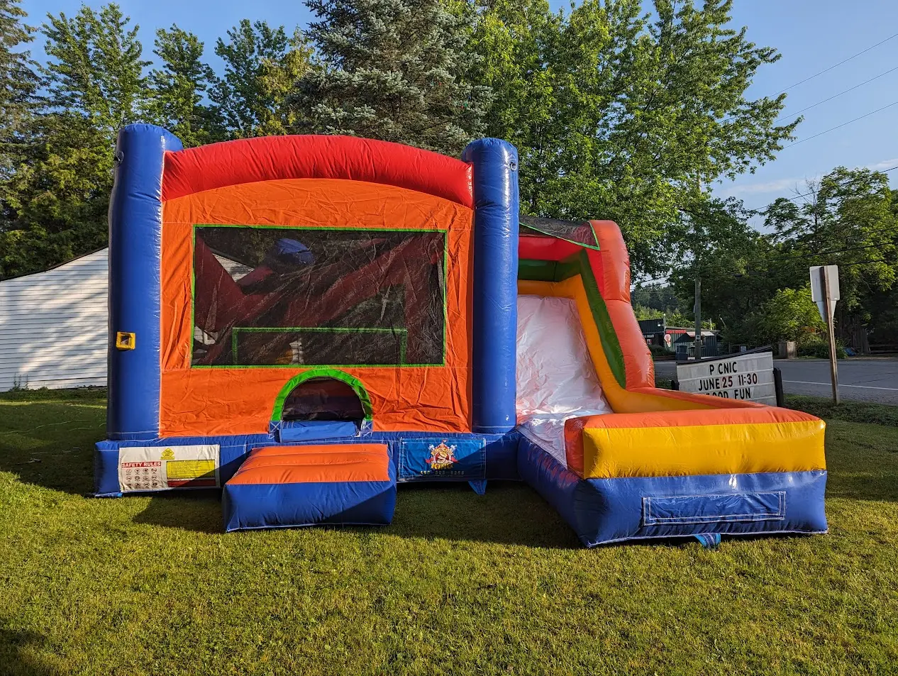 Classic Colorful Bouncy Castle inflatable rental full exterior — The Bouncy Castle King, serving the GTA