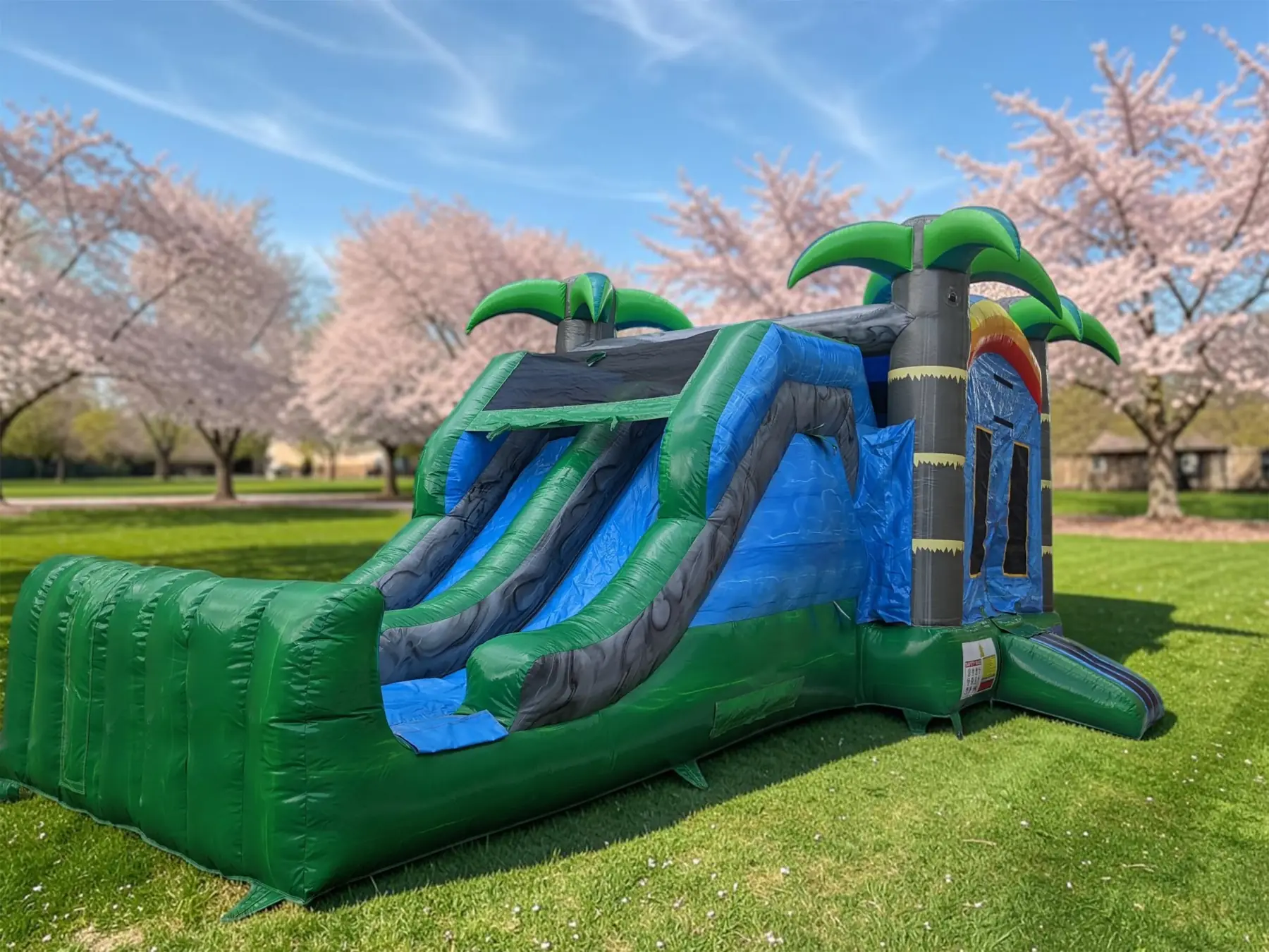 Double Slide Tropical Bouncy Castle inflatable rental full exterior — The Bouncy Castle King, serving the GTA