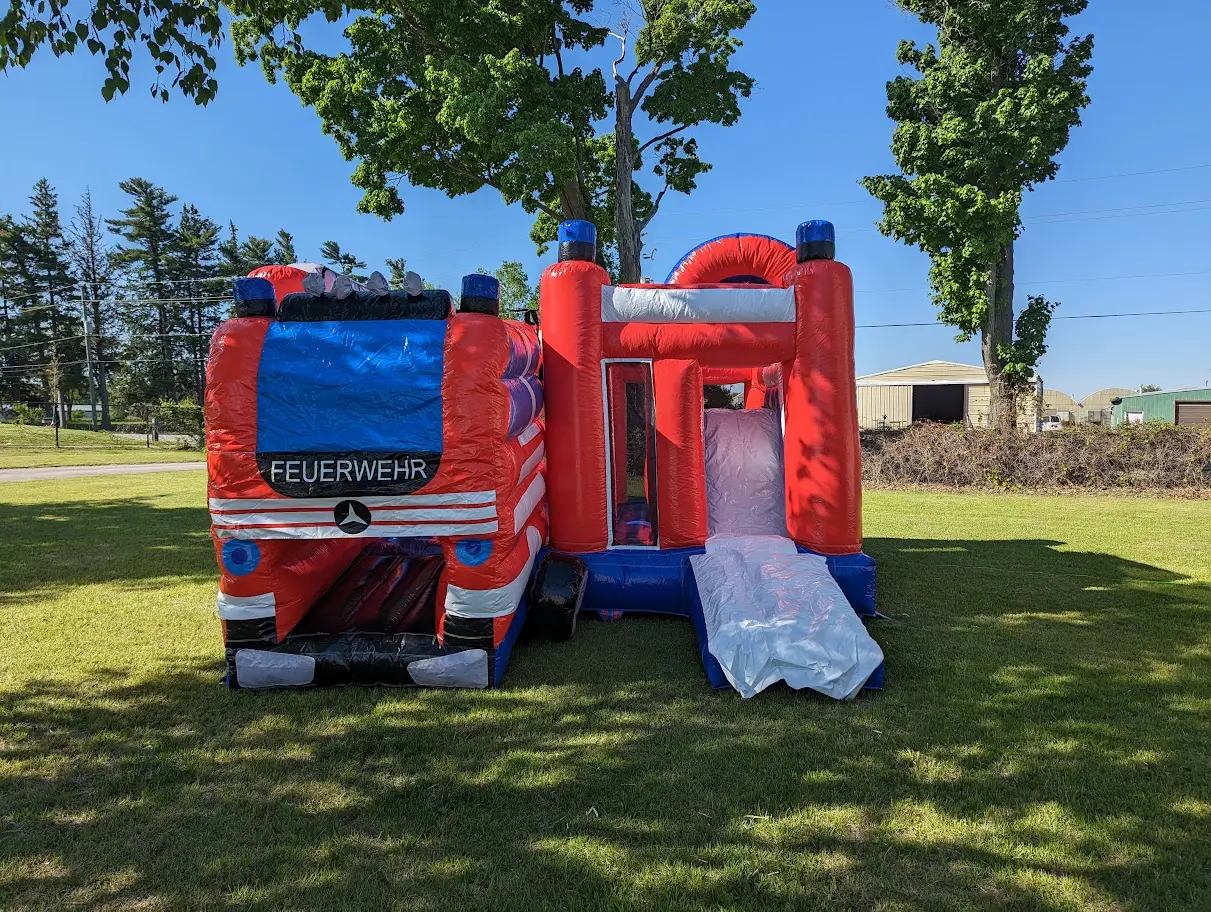Firetruck Bouncy Castle inflatable rental full exterior — The Bouncy Castle King, serving the GTA